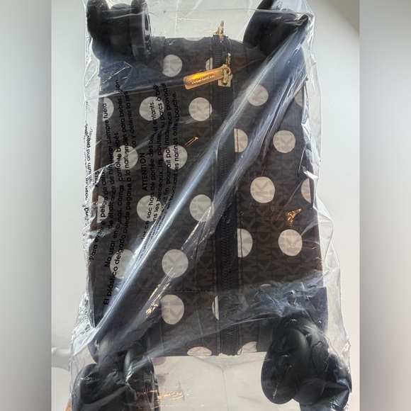 MICHAEL KORS  Small Polka Dot Signature Logo Suitcase
$898 OUT OF STOCK - Picture 10 of 12